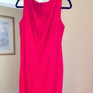 Hot pink dress with eyelet design.